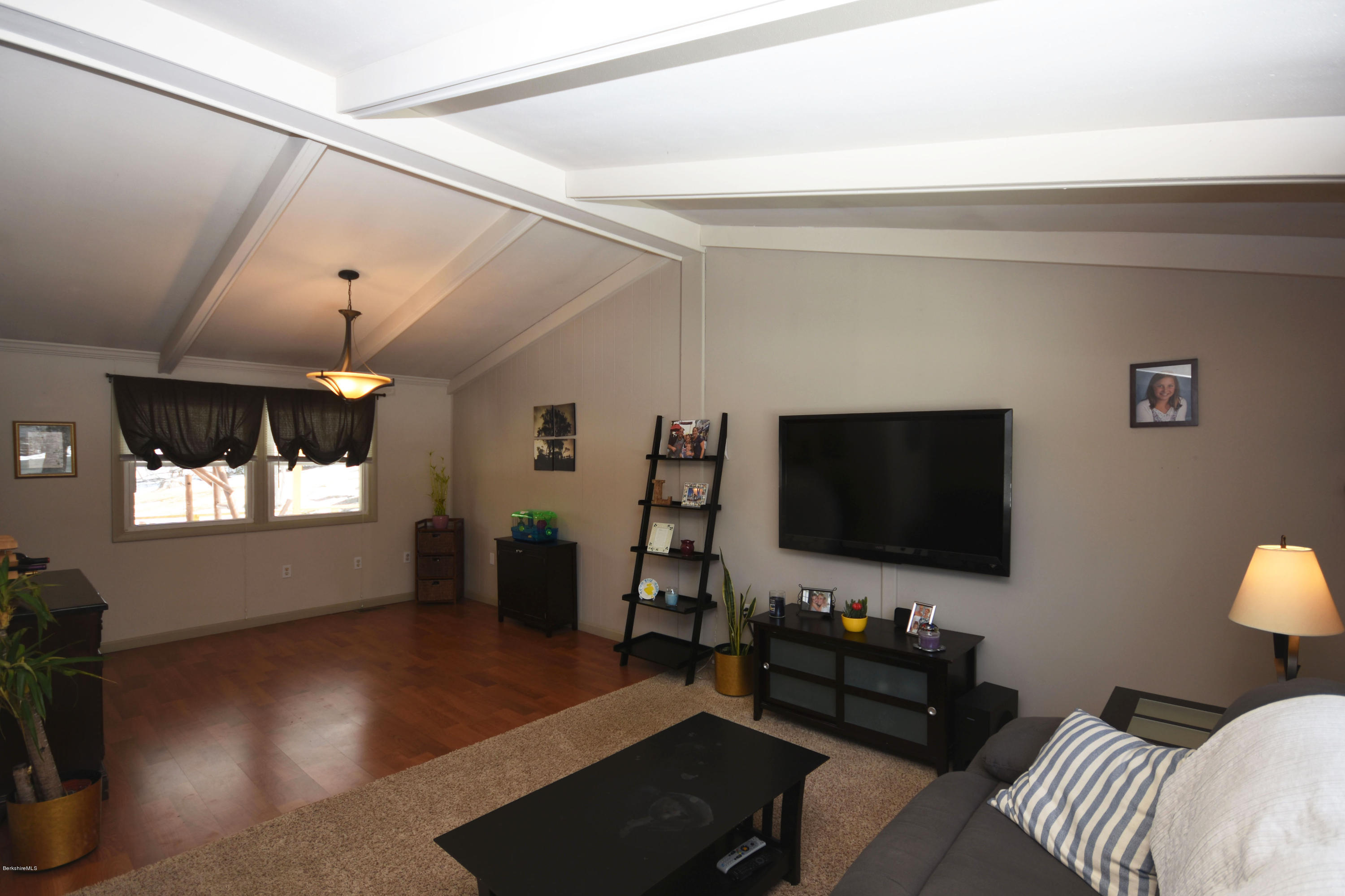10 West Main Road Peru, MA 01235 - Photo 12 of 45 a living room with furniture and a flat screen tv