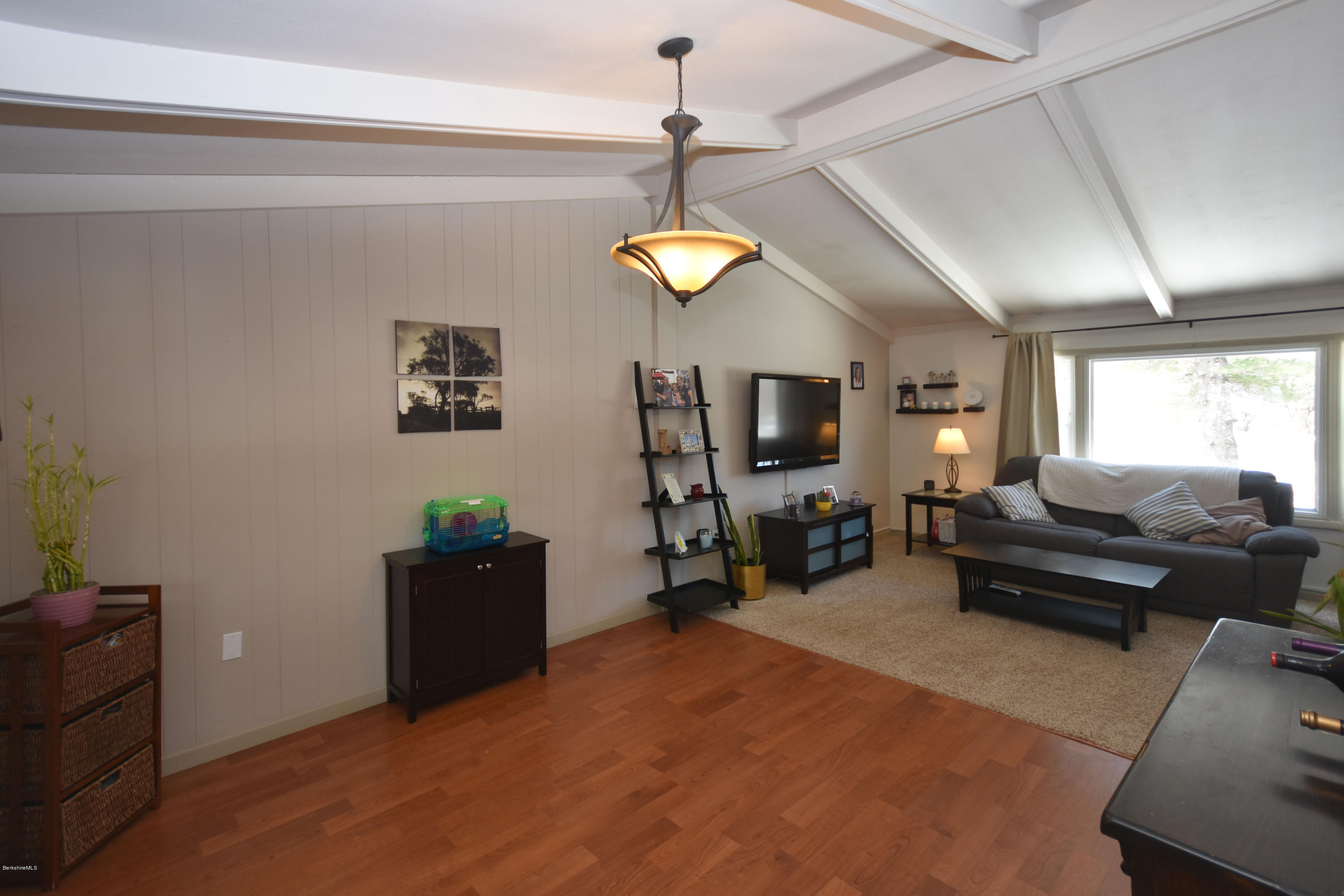 10 West Main Road Peru, MA 01235 - Photo 14 of 45 a livingroom with furniture and a flat screen tv