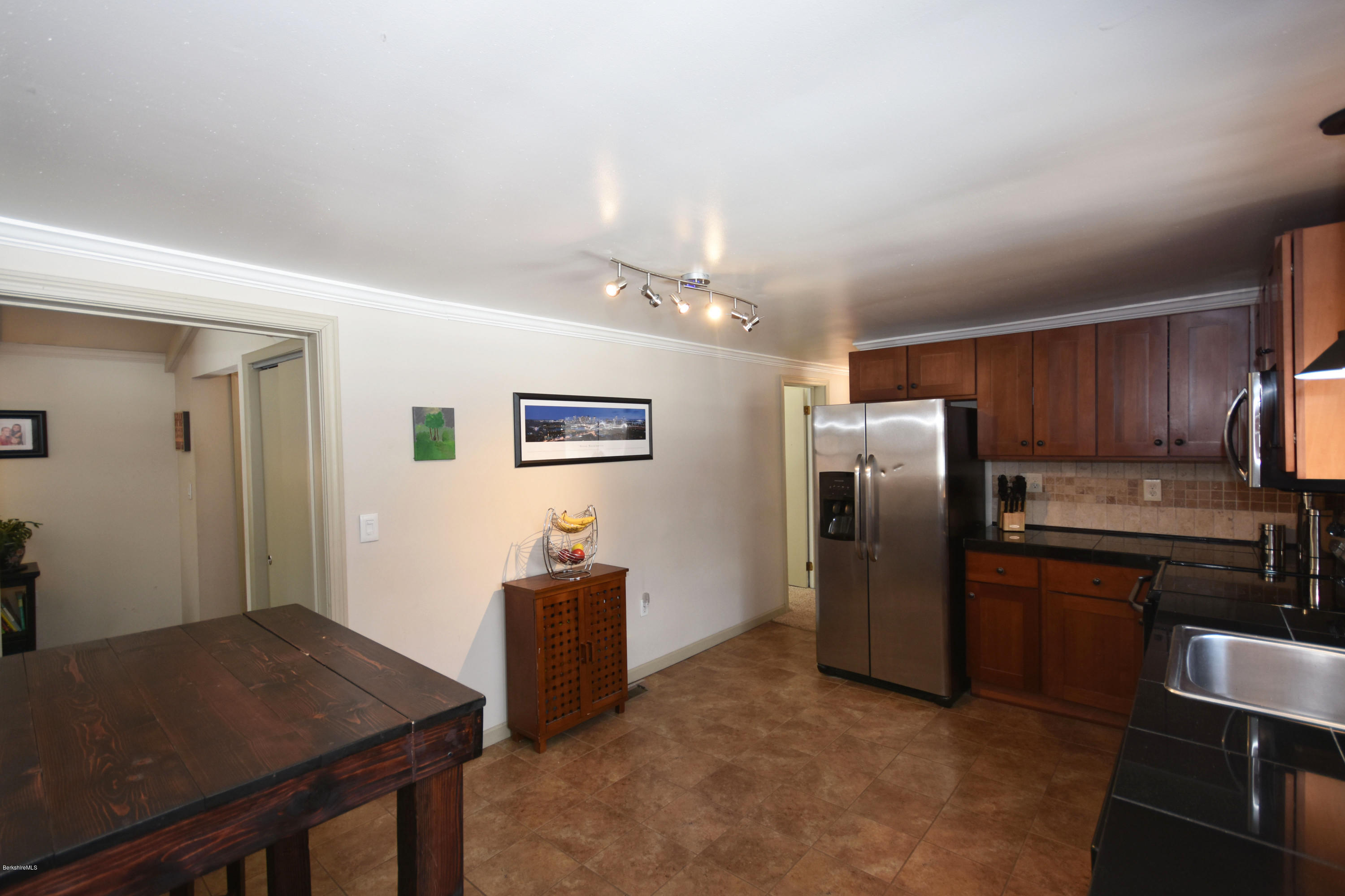 10 West Main Road Peru, MA 01235 - Photo 18 of 45 a kitchen with refrigerator cabinets and wooden floor