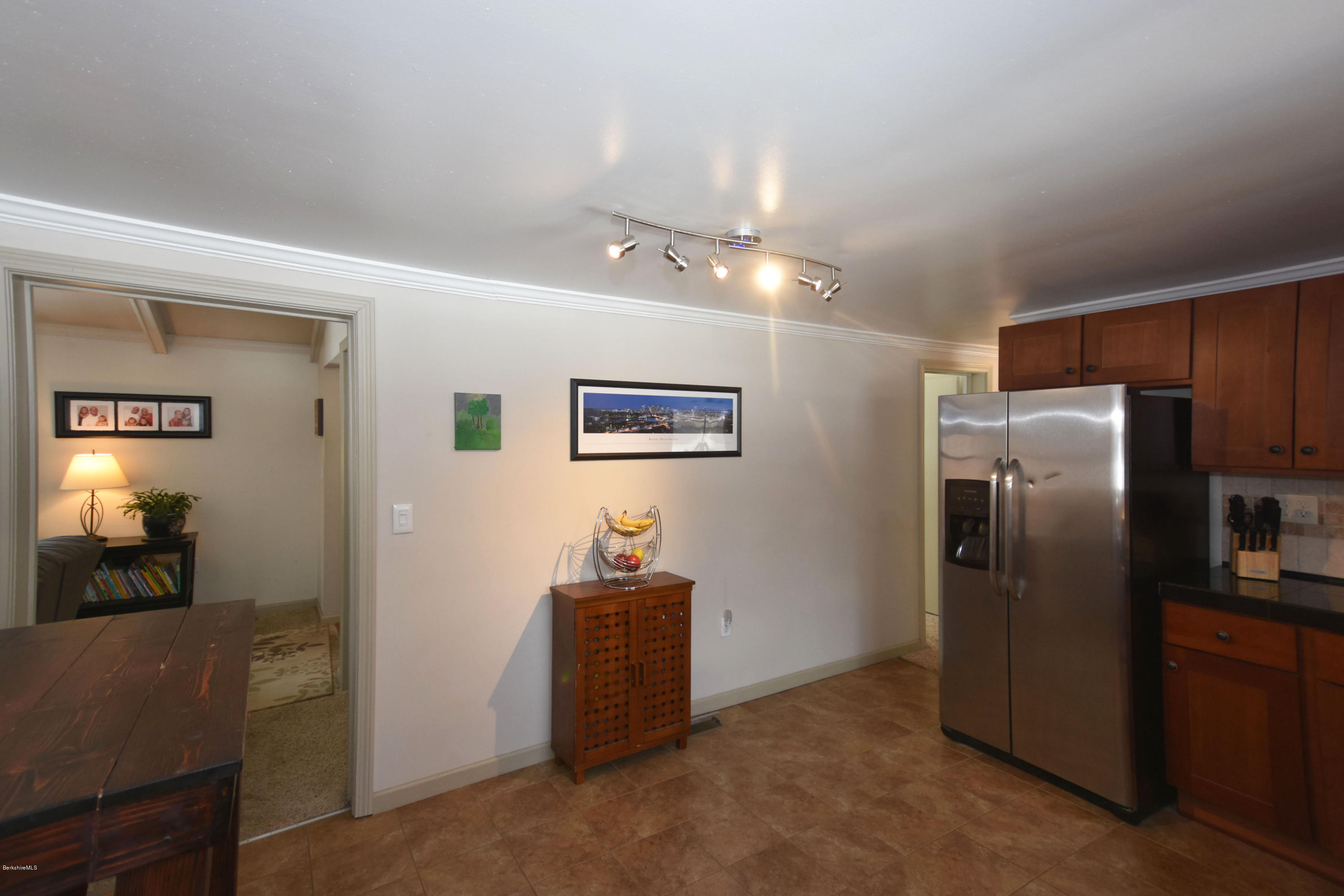 10 West Main Road Peru, MA 01235 - Photo 19 of 45 a view of a refrigerator in kitchen and an empty room