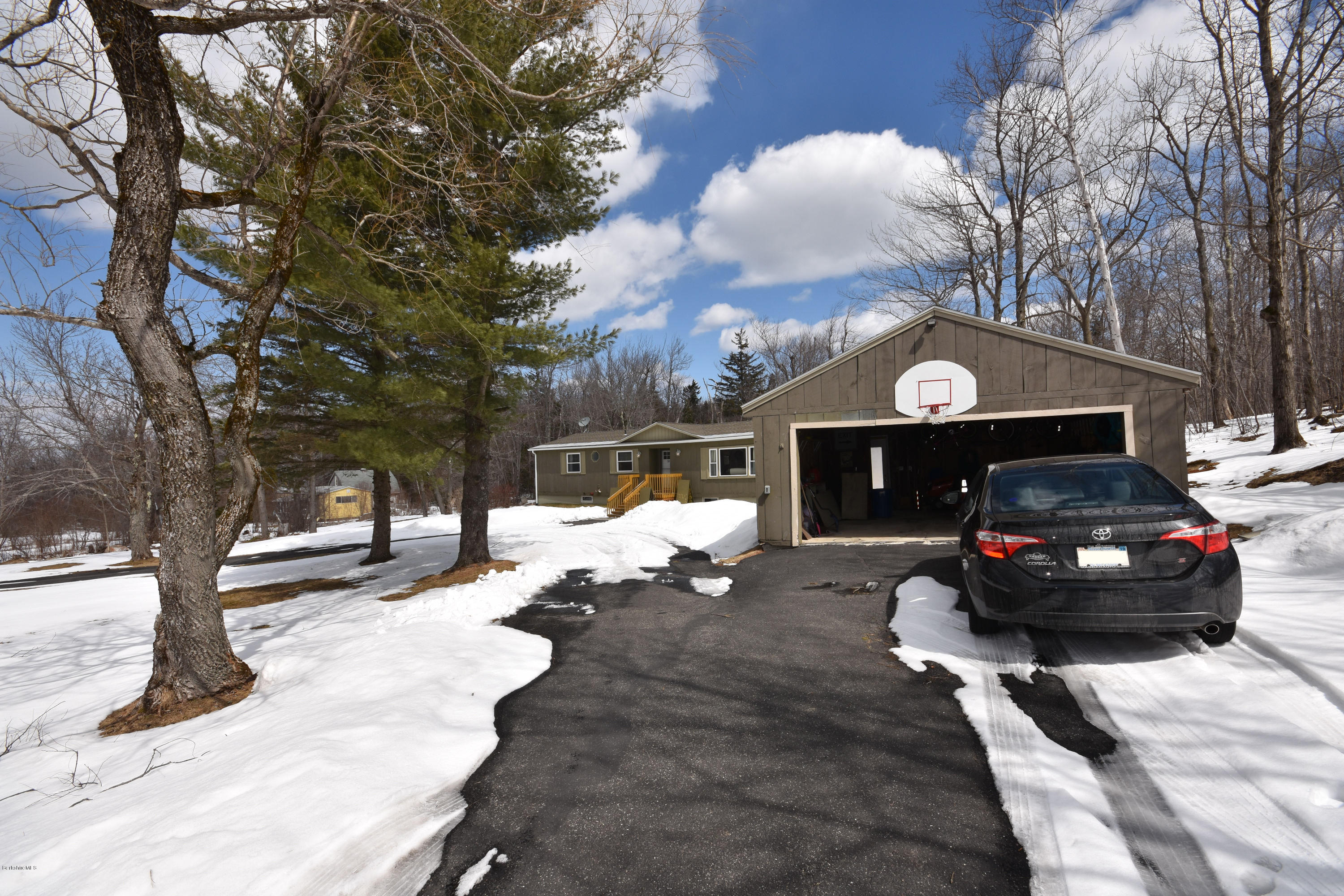 10 West Main Road Peru, MA 01235 - Photo 3 of 45 a view of a car park in front of house