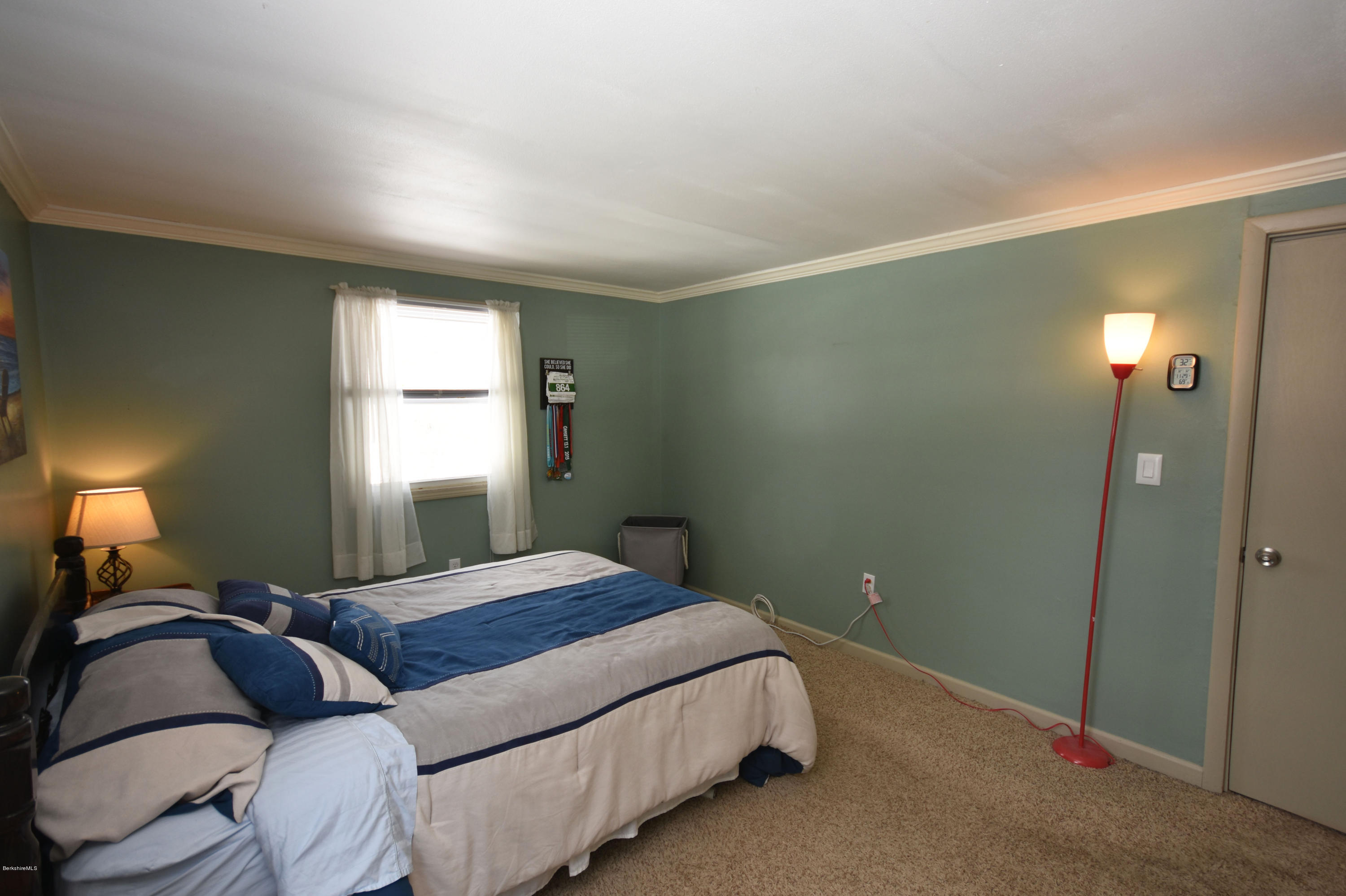 10 West Main Road Peru, MA 01235 - Photo 22 of 45 a bedroom with a bed and window