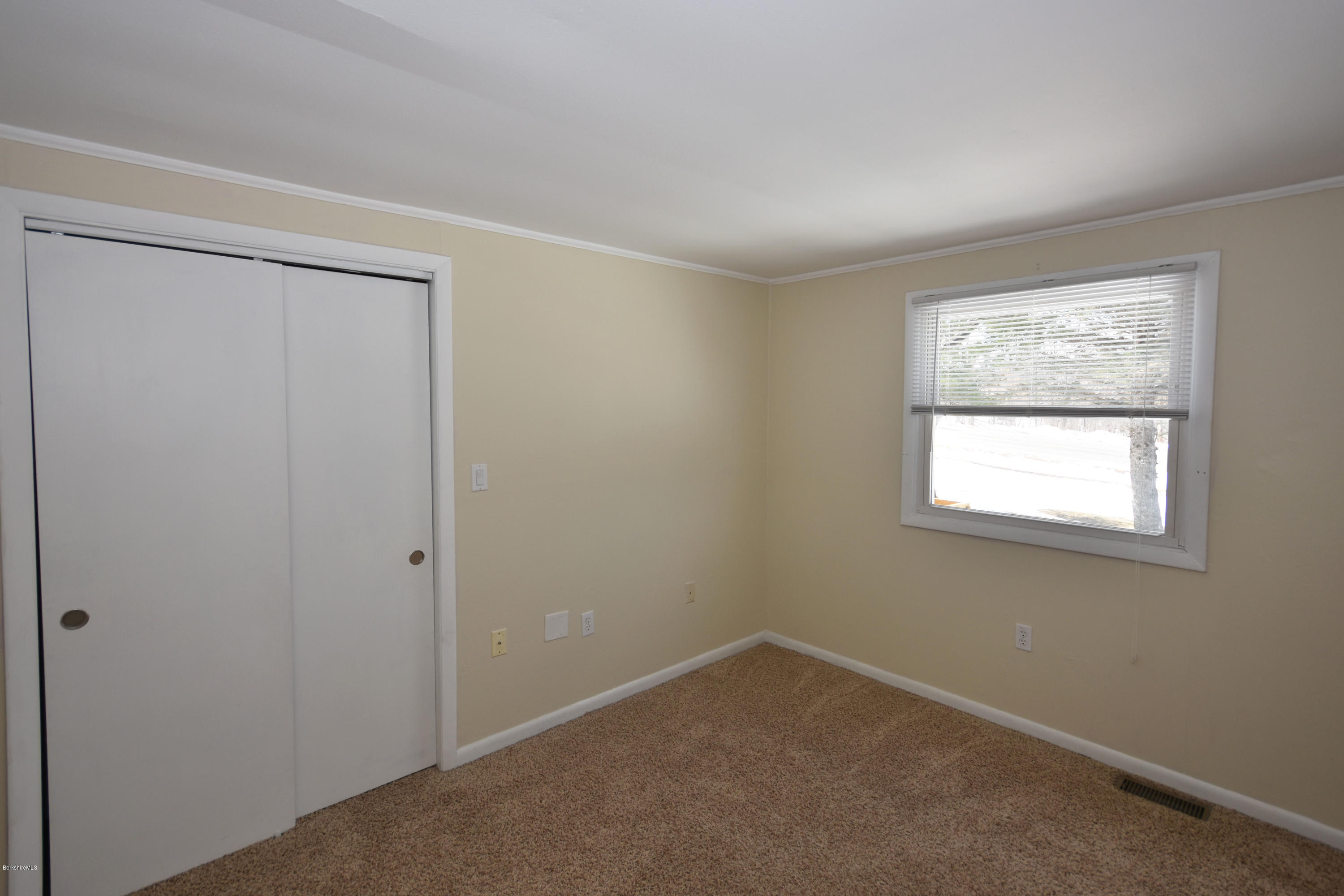 10 West Main Road Peru, MA 01235 - Photo 29 of 45 an empty room with a window