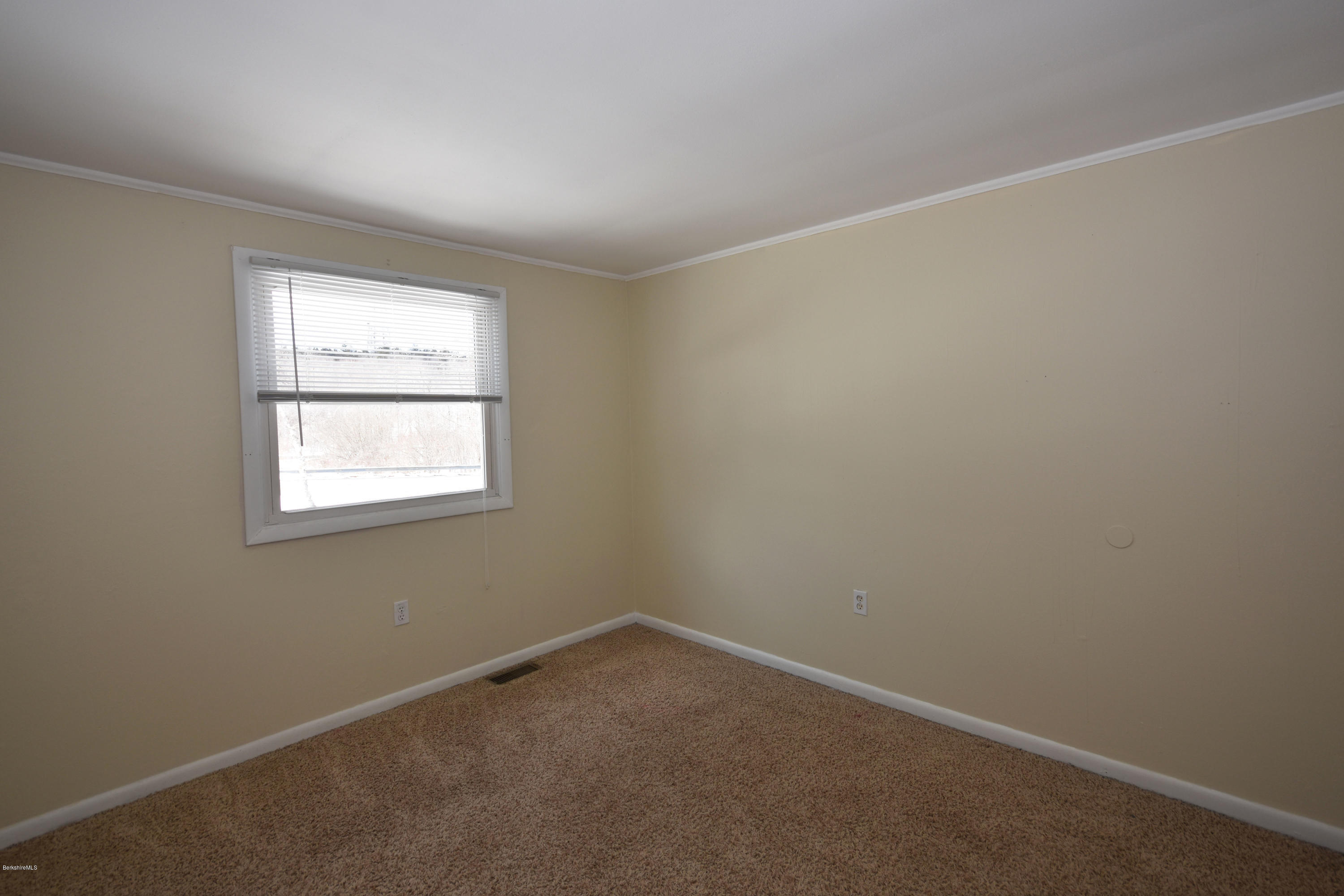 10 West Main Road Peru, MA 01235 - Photo 30 of 45 an empty room with a window