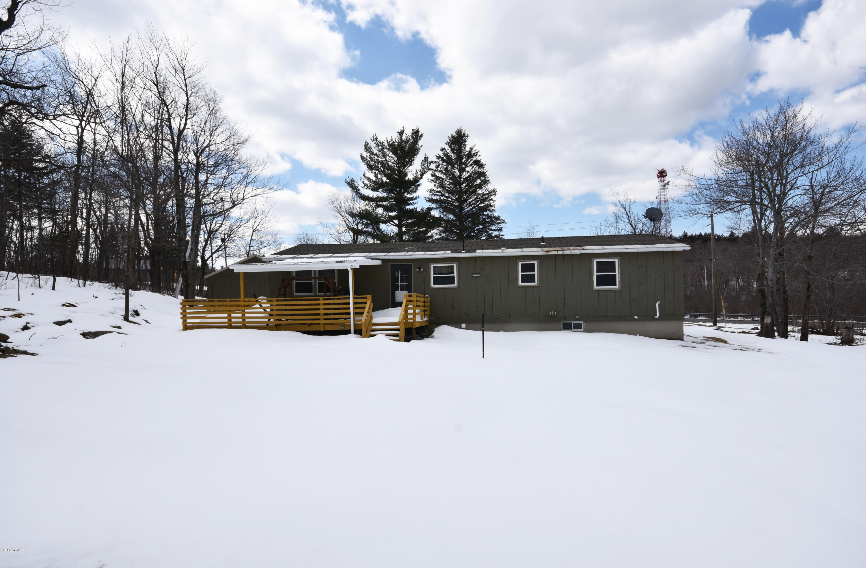10 West Main Road Peru, MA 01235 - Photo 40 of 45 a view of a house with a yard covered in snow