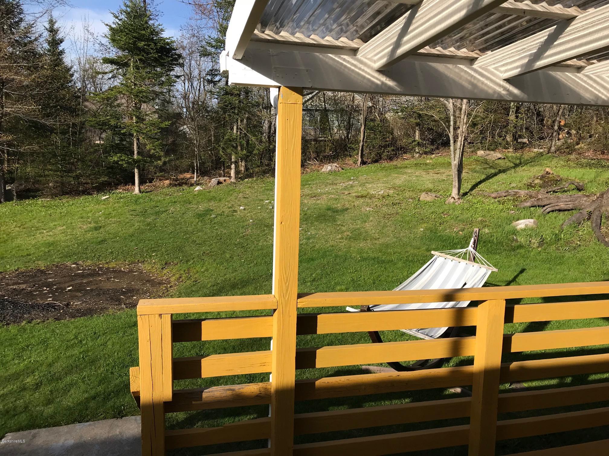 10 West Main Road Peru, MA 01235 - Photo 5 of 45 a view of a backyard with sitting area