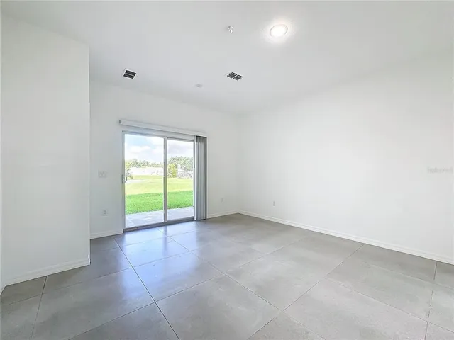an empty room with an entryway