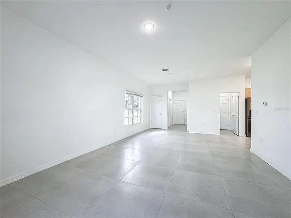 an empty room with a bathroom