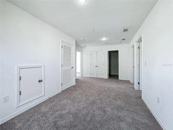 an empty room with closet
