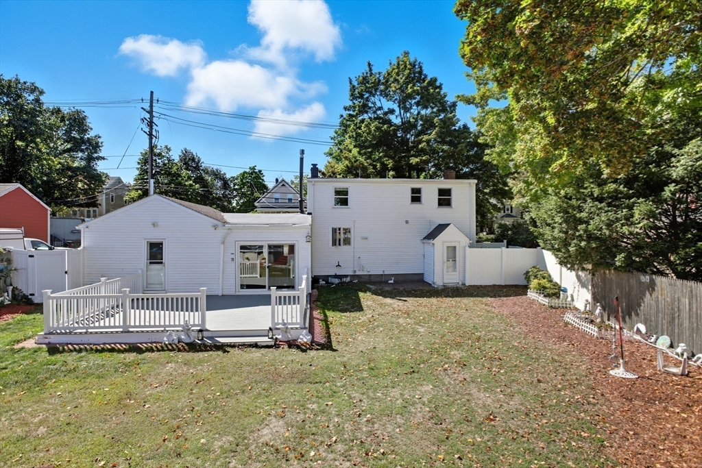 72 Collins Street Danvers, MA 01923 - Photo 18 of 24 a house view with a garden space