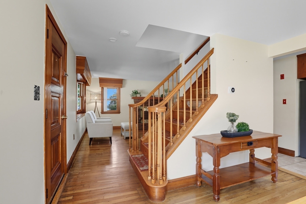 72 Collins Street Danvers, MA 01923 - Photo 8 of 24 a view of entryway and hall with wooden floor