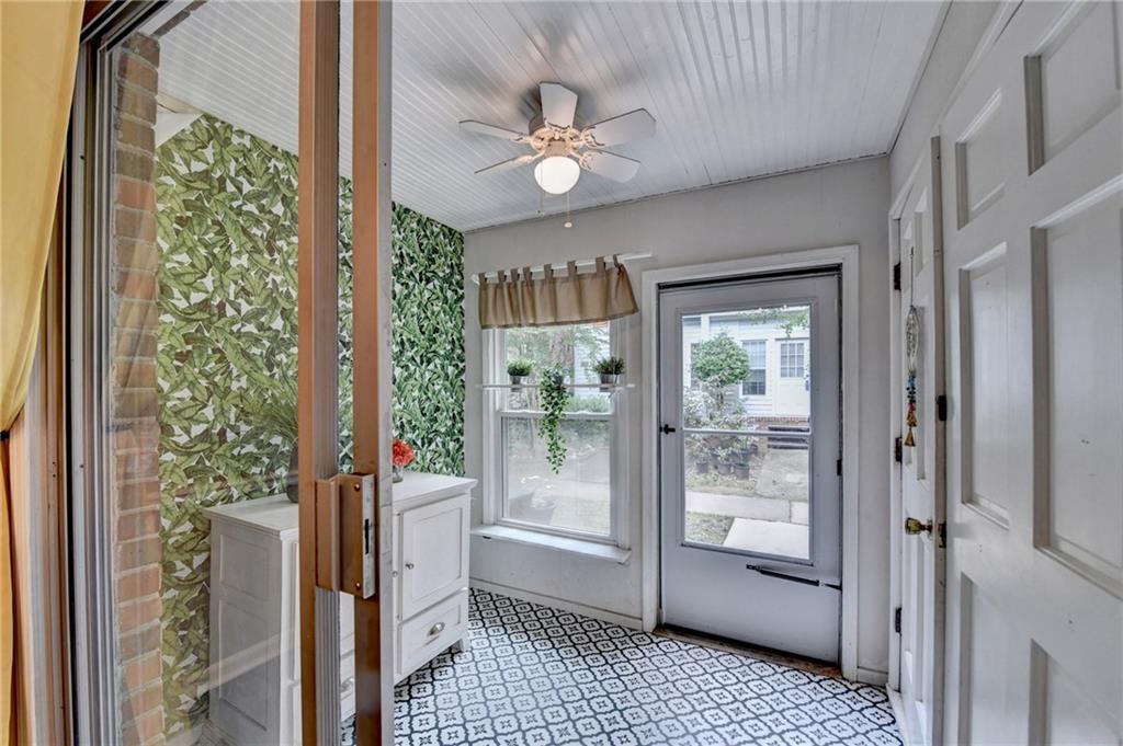 6700 Roswell Road, Unit 22B Atlanta, GA 30328 - Photo 26 of 34 a very nice looking room with a large window and front door