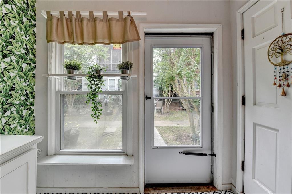 6700 Roswell Road, Unit 22B Atlanta, GA 30328 - Photo 28 of 34 a view of a glass door and front door