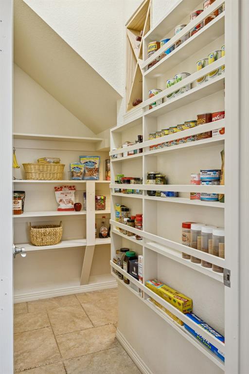 1520 Snider Court Lucas, TX 75002 - Photo 9 of 40 Unbelieveable walk in pantry has a special nook for wine storage.