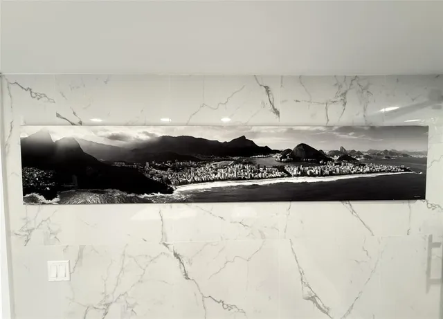 a kitchen with stainless steel appliances a stove microwave and sink