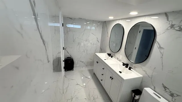 an aerial view of a fireplace with table and chairs