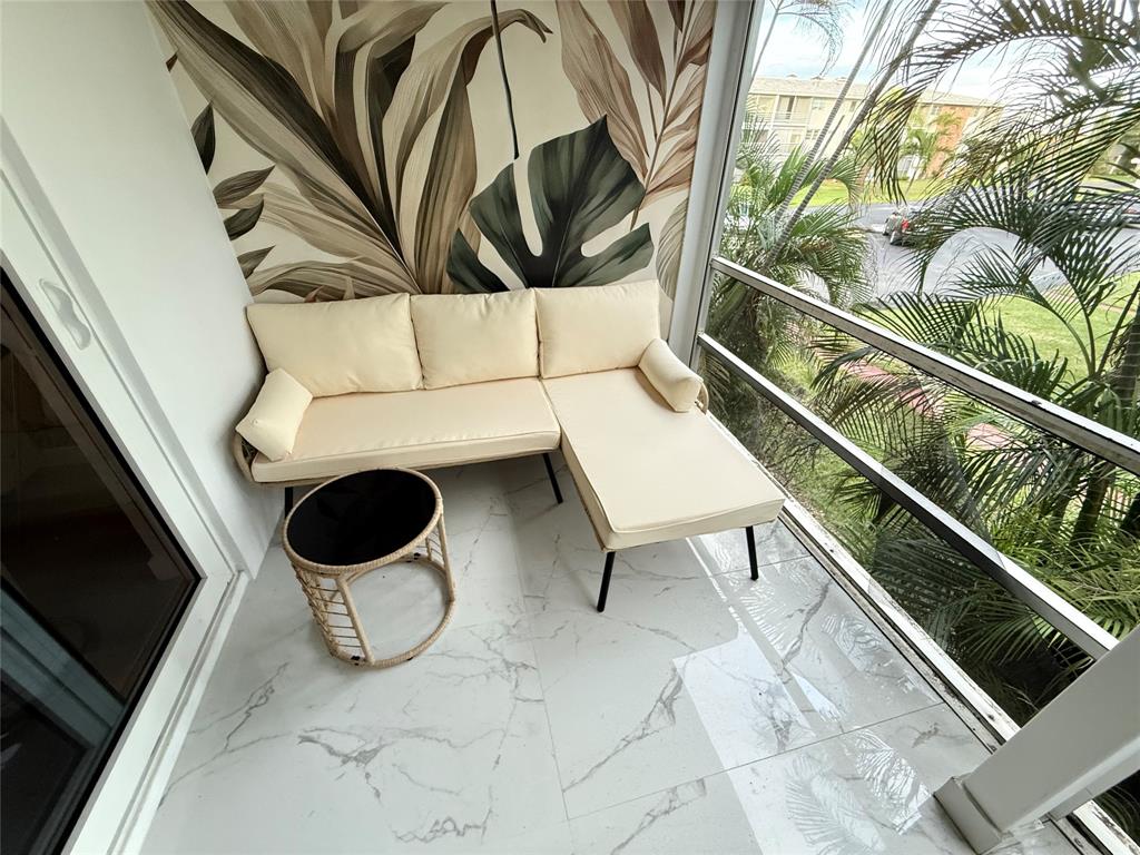 10 Southeast 13th Street, Unit B3 Boca Raton, FL 33432 - Photo 59 of 85 a view of entryway and hall with wooden floor