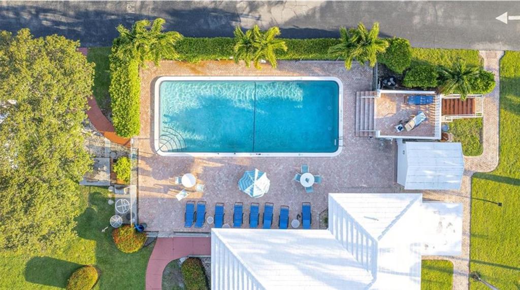 10 Southeast 13th Street, Unit B3 Boca Raton, FL 33432 - Photo 73 of 85 a vase of flowers sitting on a table