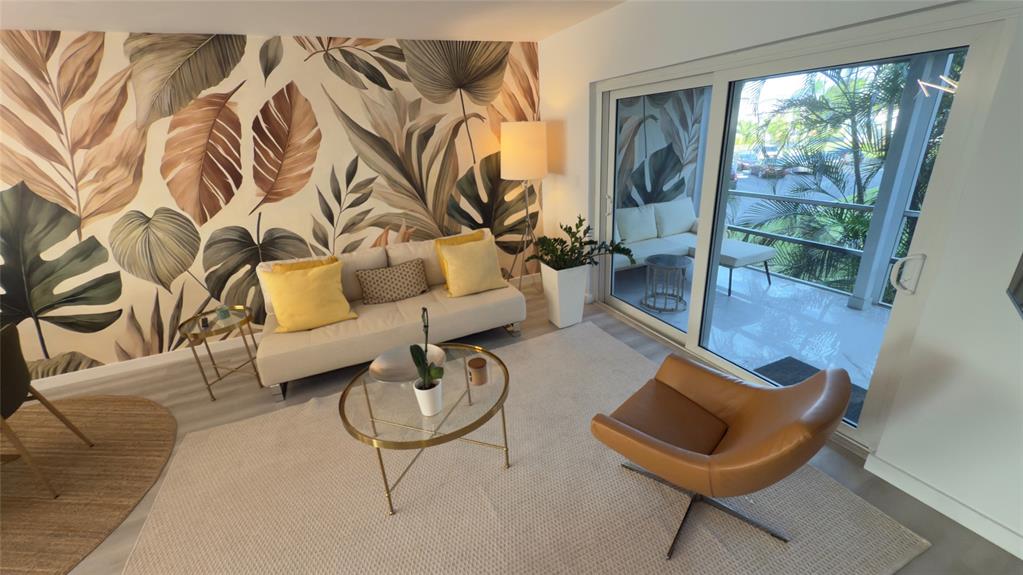 10 Southeast 13th Street, Unit B3 Boca Raton, FL 33432 - Photo 8 of 85 a living room with furniture and a floor to ceiling window