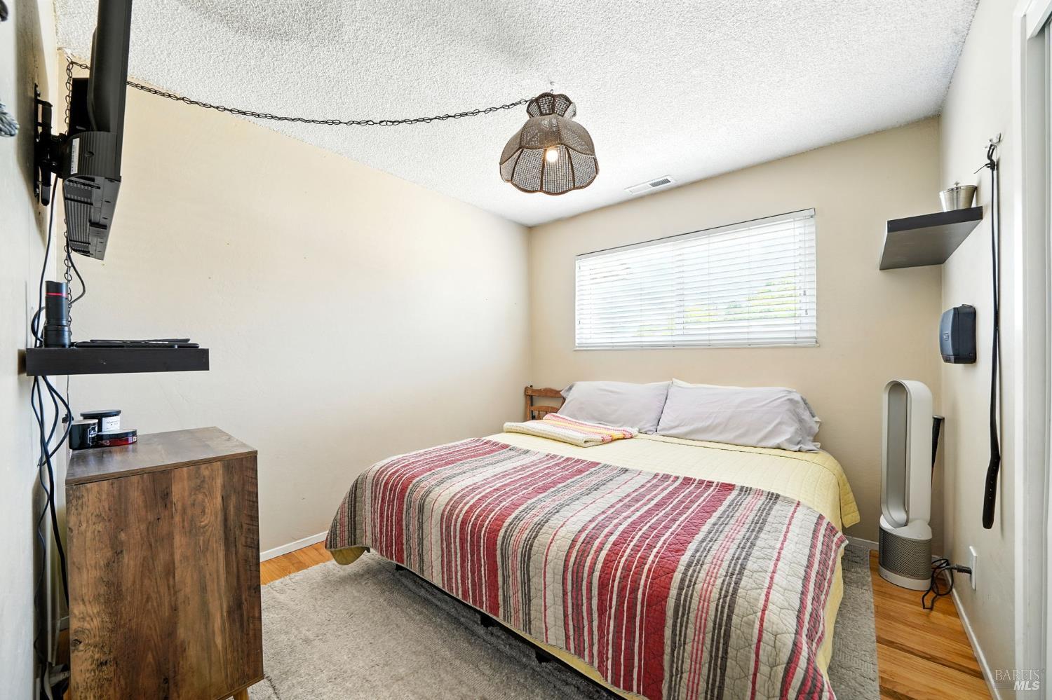 4272 Brentwood Circle Concord, CA 94521 - Photo 12 of 33 a bedroom with a bed and a chandelier