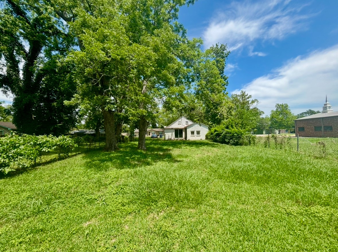 701 North Hackberry Street Sweeny, TX 77480 - Photo 12 of 12 a view of a house with a yard