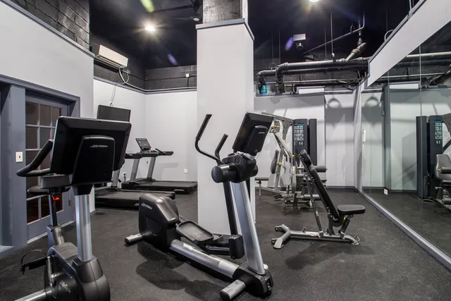 a view of a room with gym equipment
