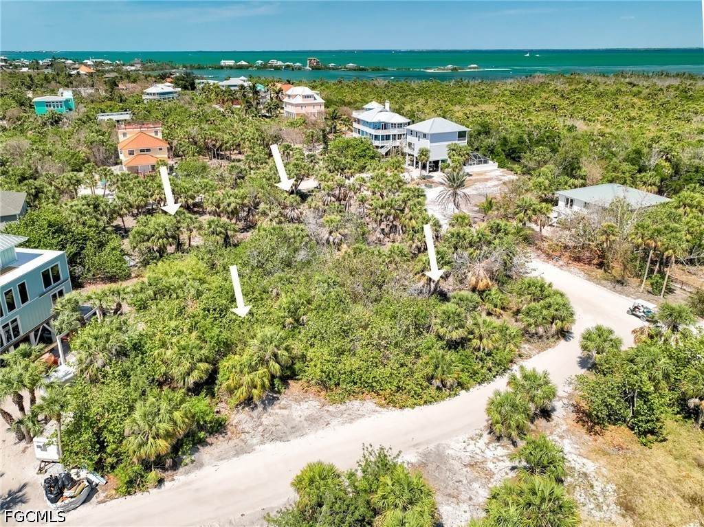 4430 Conch Shell Drive Upper Captiva, FL 33924 - Photo 18 of 32 a view of a city with an ocean