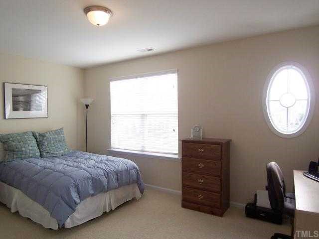 The 2nd Bedroom has neutral carpet, lg closet, and its own spacious Bath w/neutral tiled flr - great for roommates! There is also a convenient Laundry closet in the hallway between the Bedrooms.