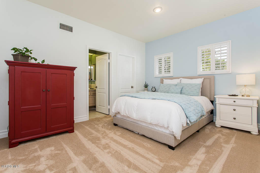 11245 Bentcreek Road Moorpark, CA 93021 - Photo 12 of 48 a bedroom with a bed and a dresser