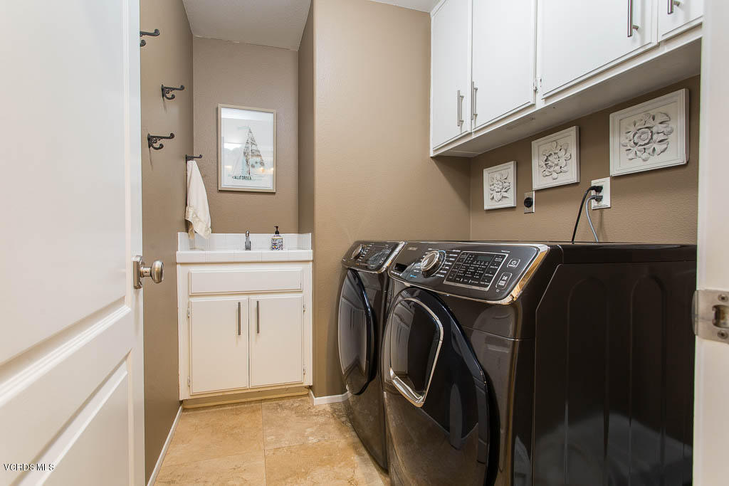 11245 Bentcreek Road Moorpark, CA 93021 - Photo 15 of 48 a utility room with dryer and washer