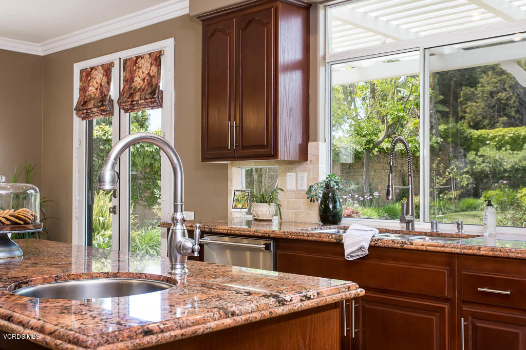 11245 Bentcreek Road Moorpark, CA 93021 - Photo 25 of 48 a kitchen with kitchen island a large window in it