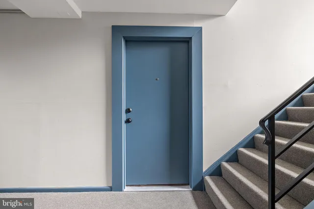 a view of entryway with wooden floor