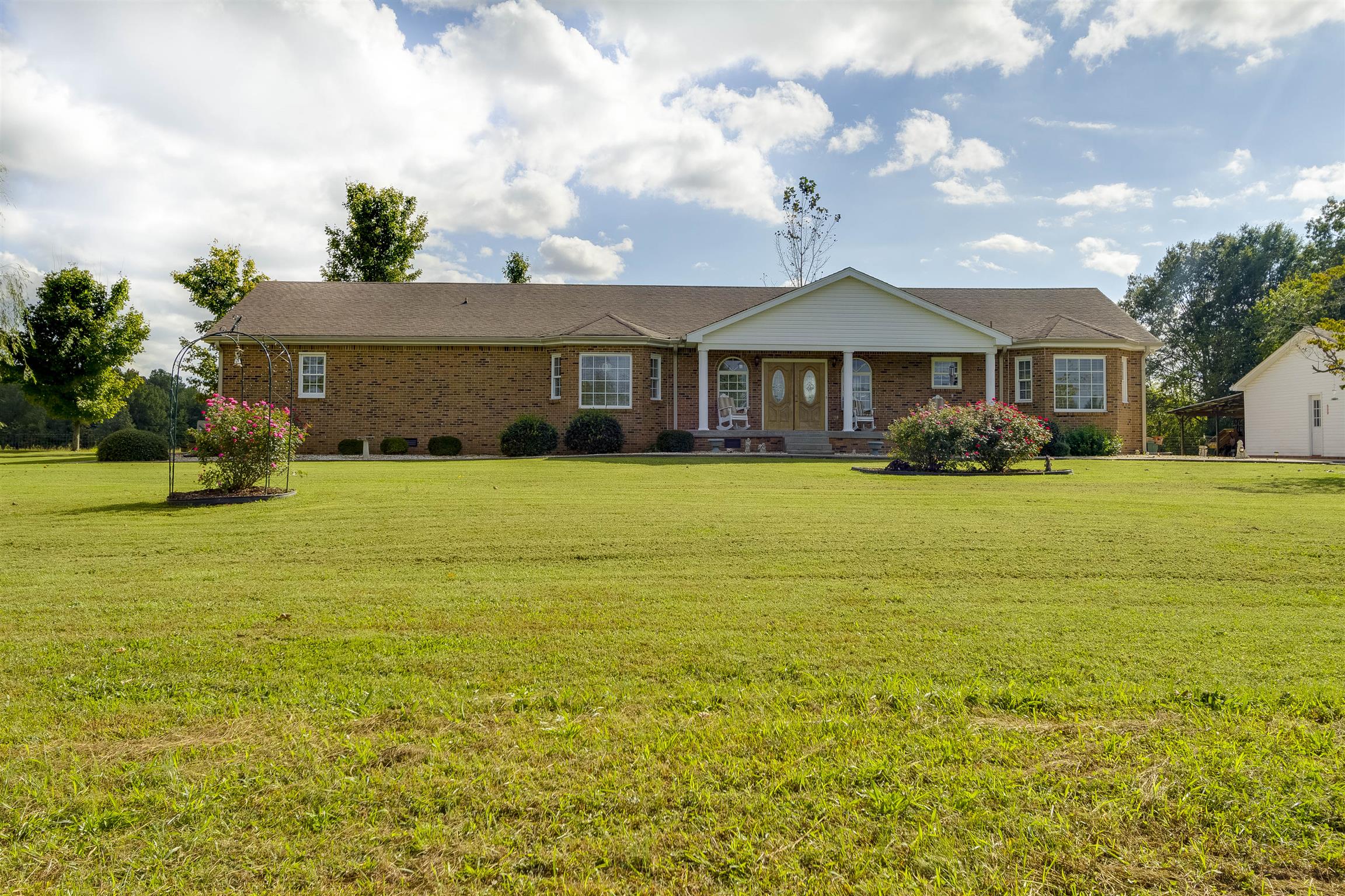5067 Youngville Road Springfield, TN 37172 - Photo 1 of 28 a front view of a house with a yard