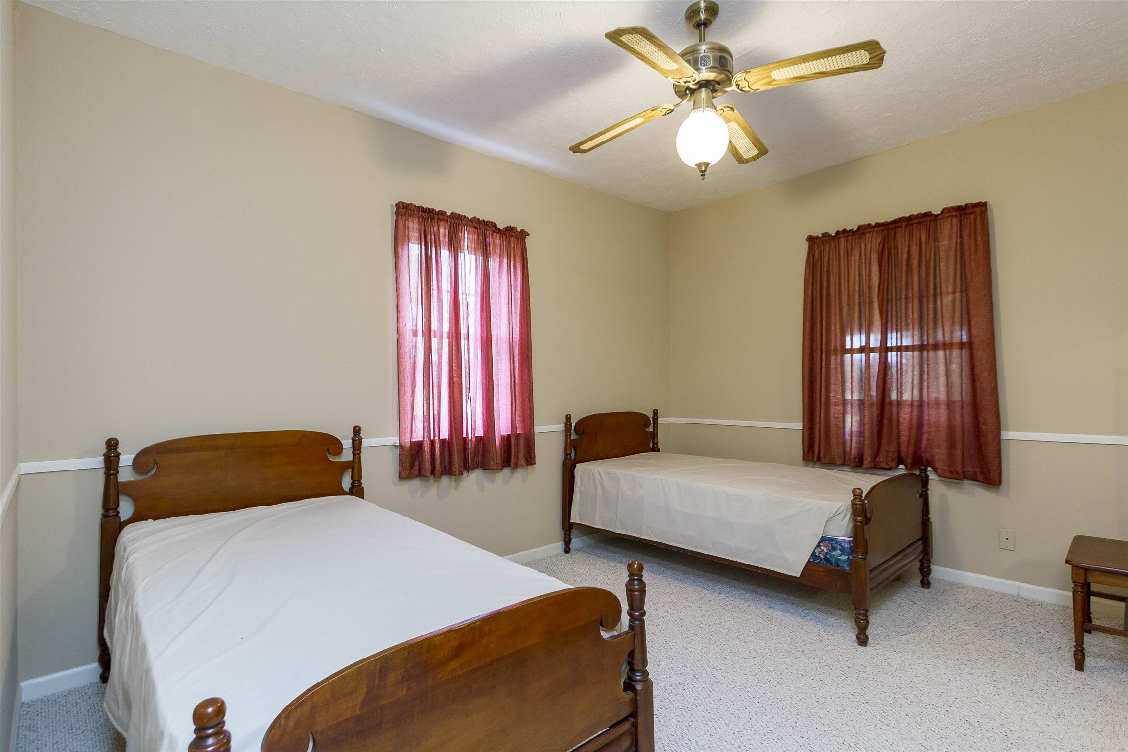 5067 Youngville Road Springfield, TN 37172 - Photo 14 of 28 a bedroom with two beds and a window