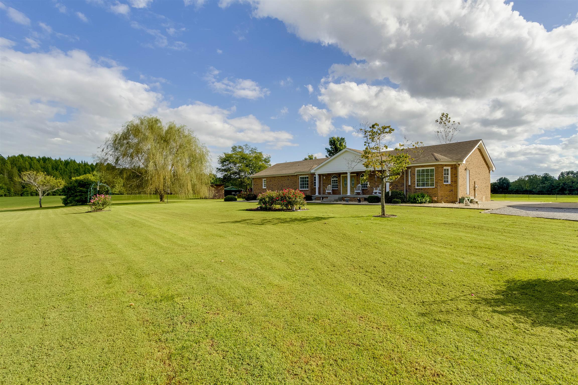 5067 Youngville Road Springfield, TN 37172 - Photo 20 of 28 a front view of house with an outdoor space and seating