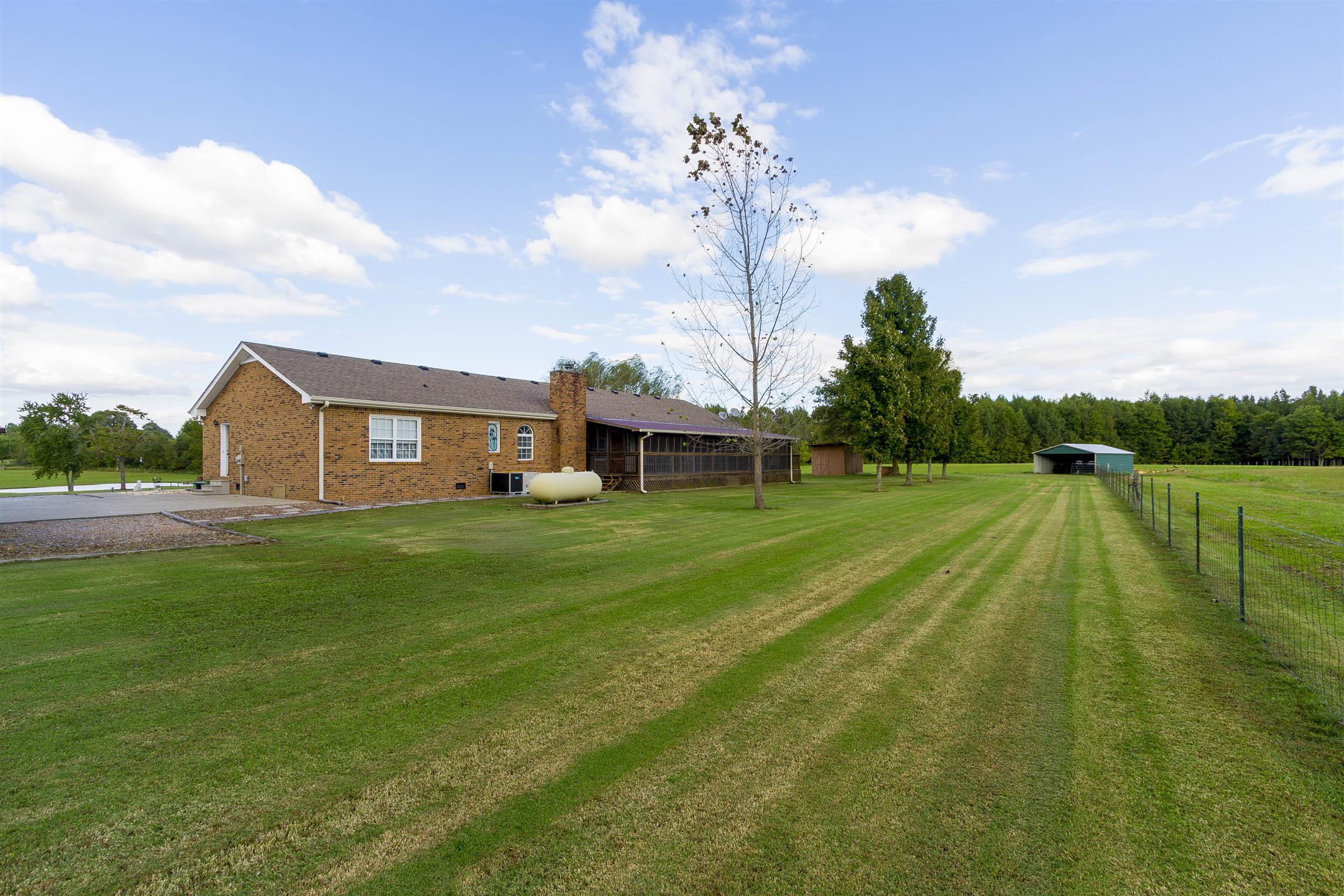 5067 Youngville Road Springfield, TN 37172 - Photo 24 of 28 a view of a house with a big yard