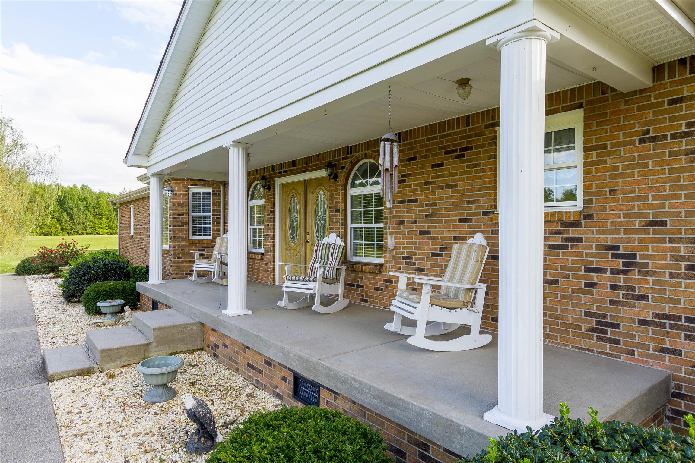 5067 Youngville Road Springfield, TN 37172 - Photo 25 of 28 a front view of a house with outdoor seating