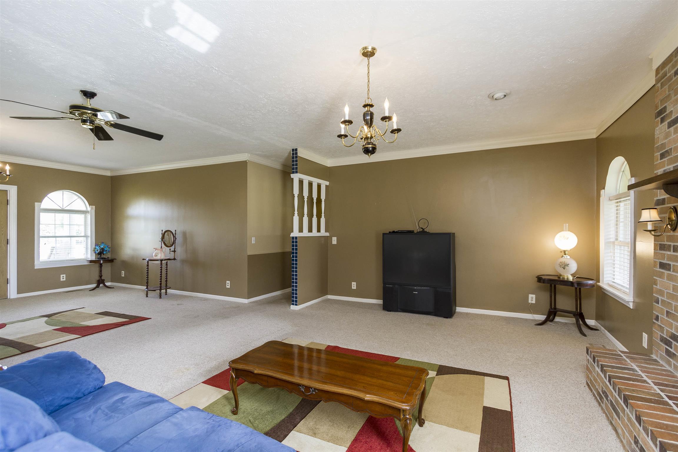 5067 Youngville Road Springfield, TN 37172 - Photo 3 of 28 a living room with furniture and a flat screen tv