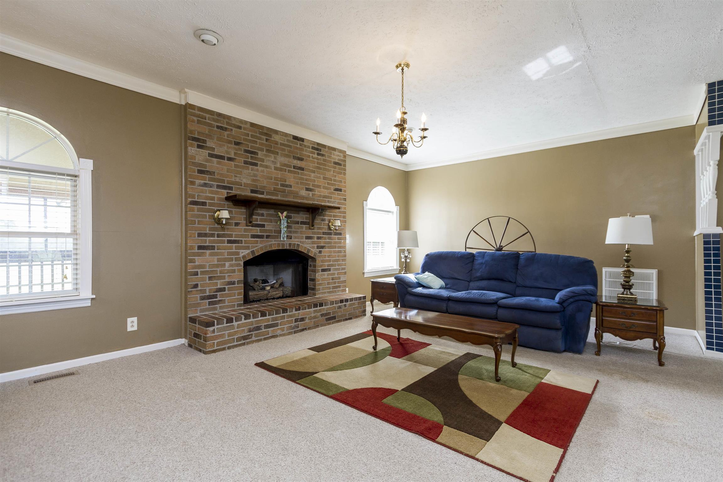 5067 Youngville Road Springfield, TN 37172 - Photo 4 of 28 a living room with furniture and a fireplace