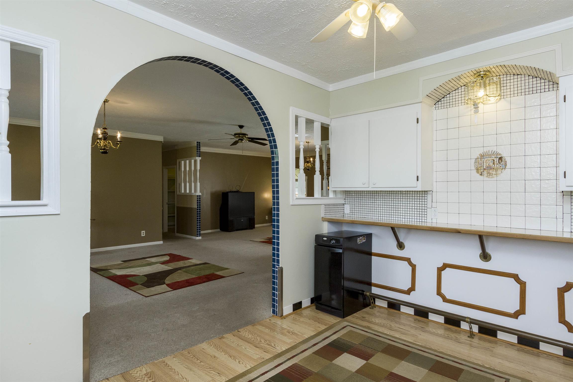 5067 Youngville Road Springfield, TN 37172 - Photo 9 of 28 a kitchen with sink refrigerator and cabinets