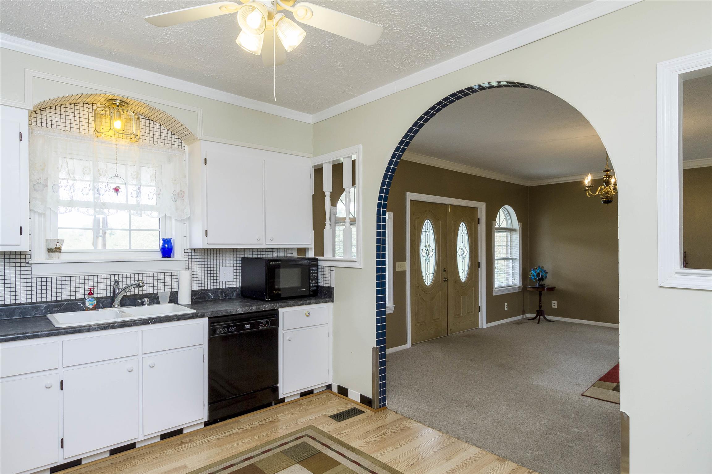 5067 Youngville Road Springfield, TN 37172 - Photo 10 of 28 a kitchen with a sink appliances and cabinets