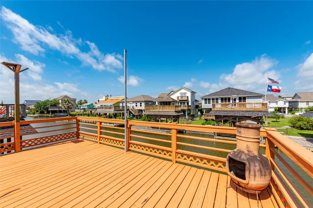 a view of a chairs and table in a balcony