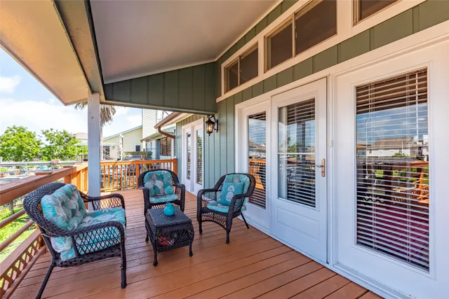 a view of a house with a yard from a patio