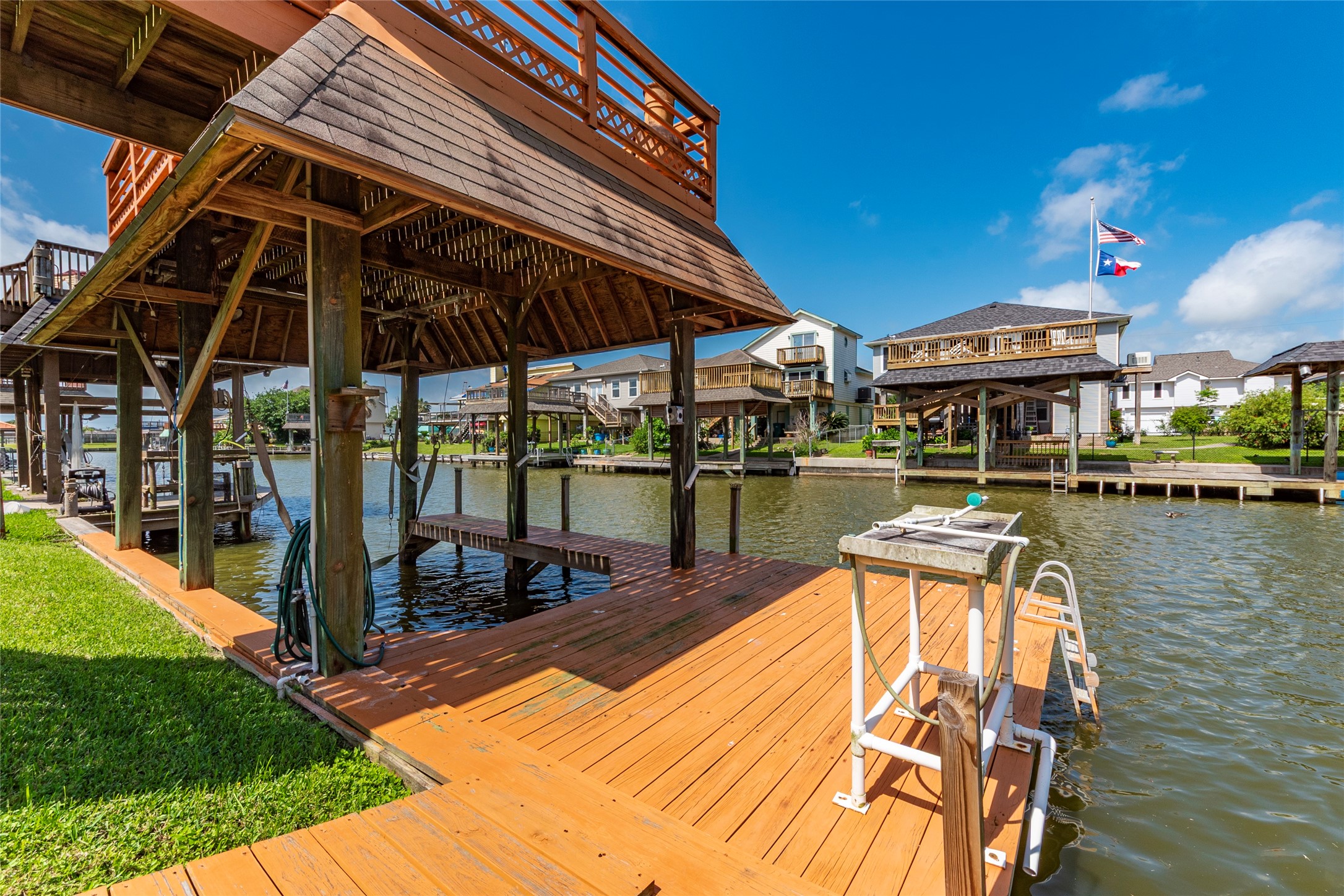3 Pelican La Marque, TX 77568 - Photo 37 of 46 a view of a patio with swimming pool table and chairs