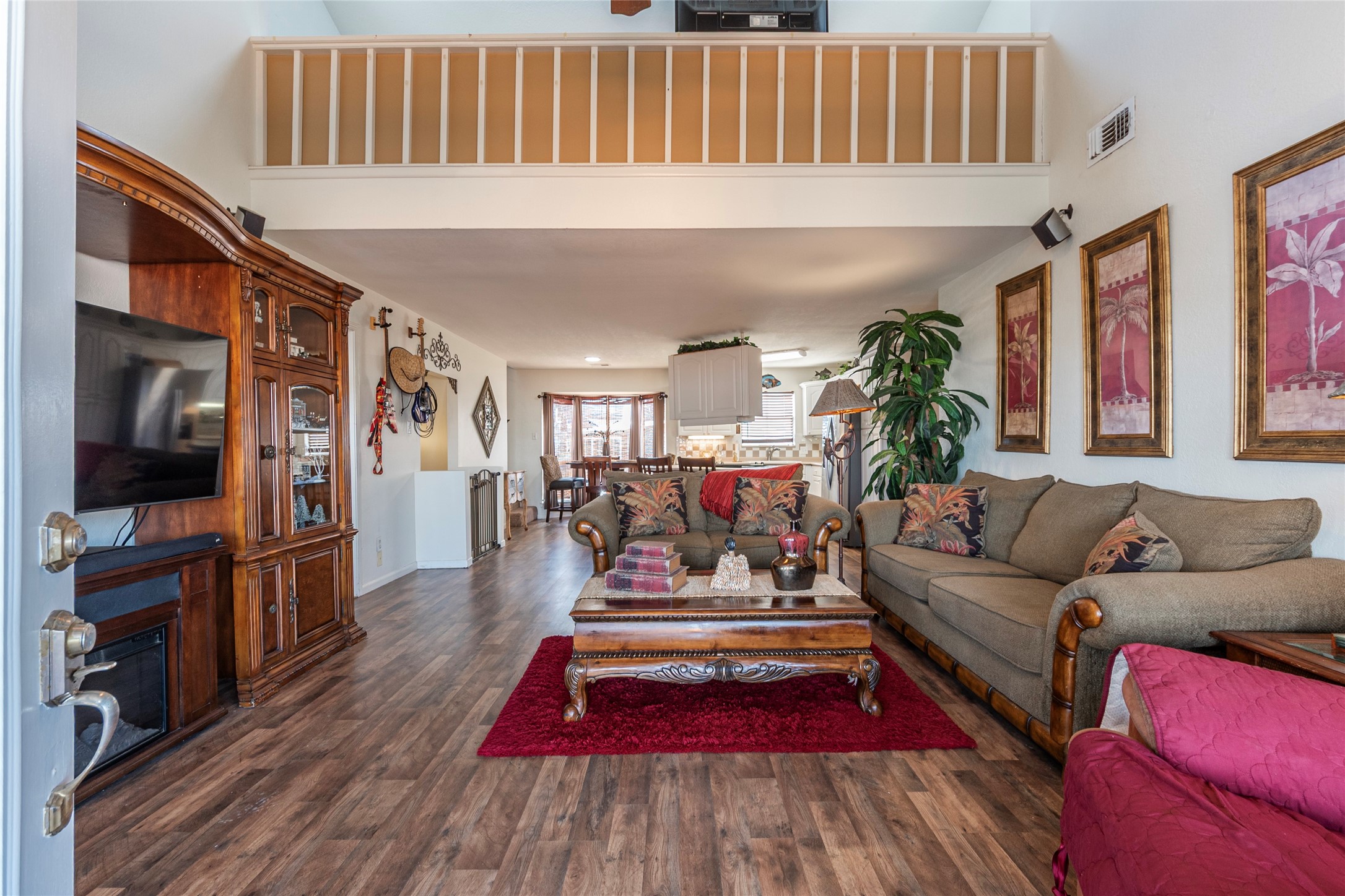 3 Pelican La Marque, TX 77568 - Photo 6 of 46 a living room with furniture a flat screen tv and a rug