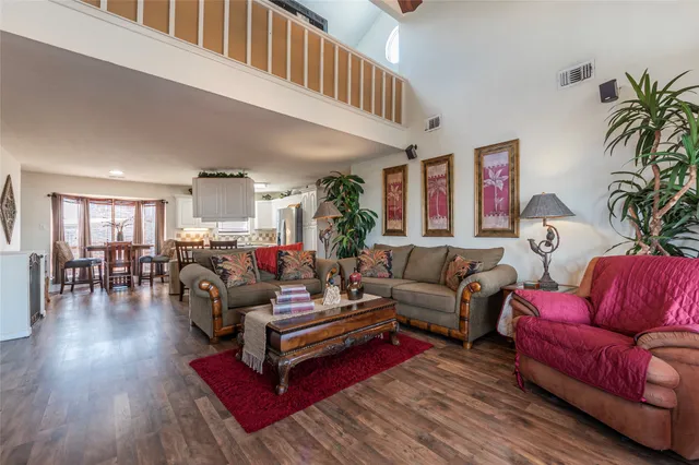 a kitchen with a sink stove and refrigerator