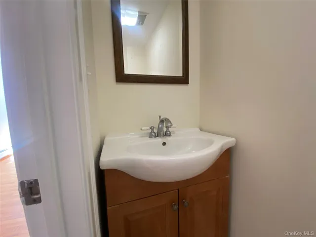 a sink with a mirror