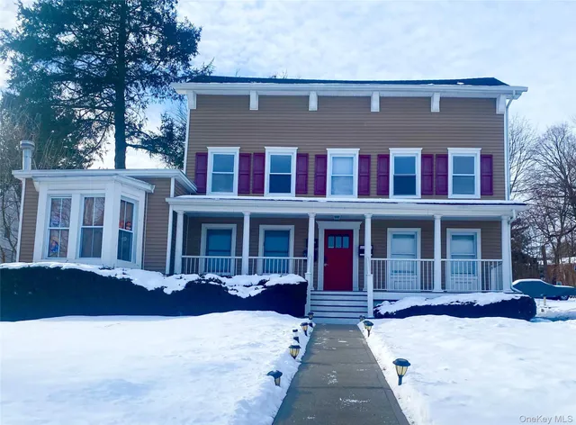 a front view of residential houses