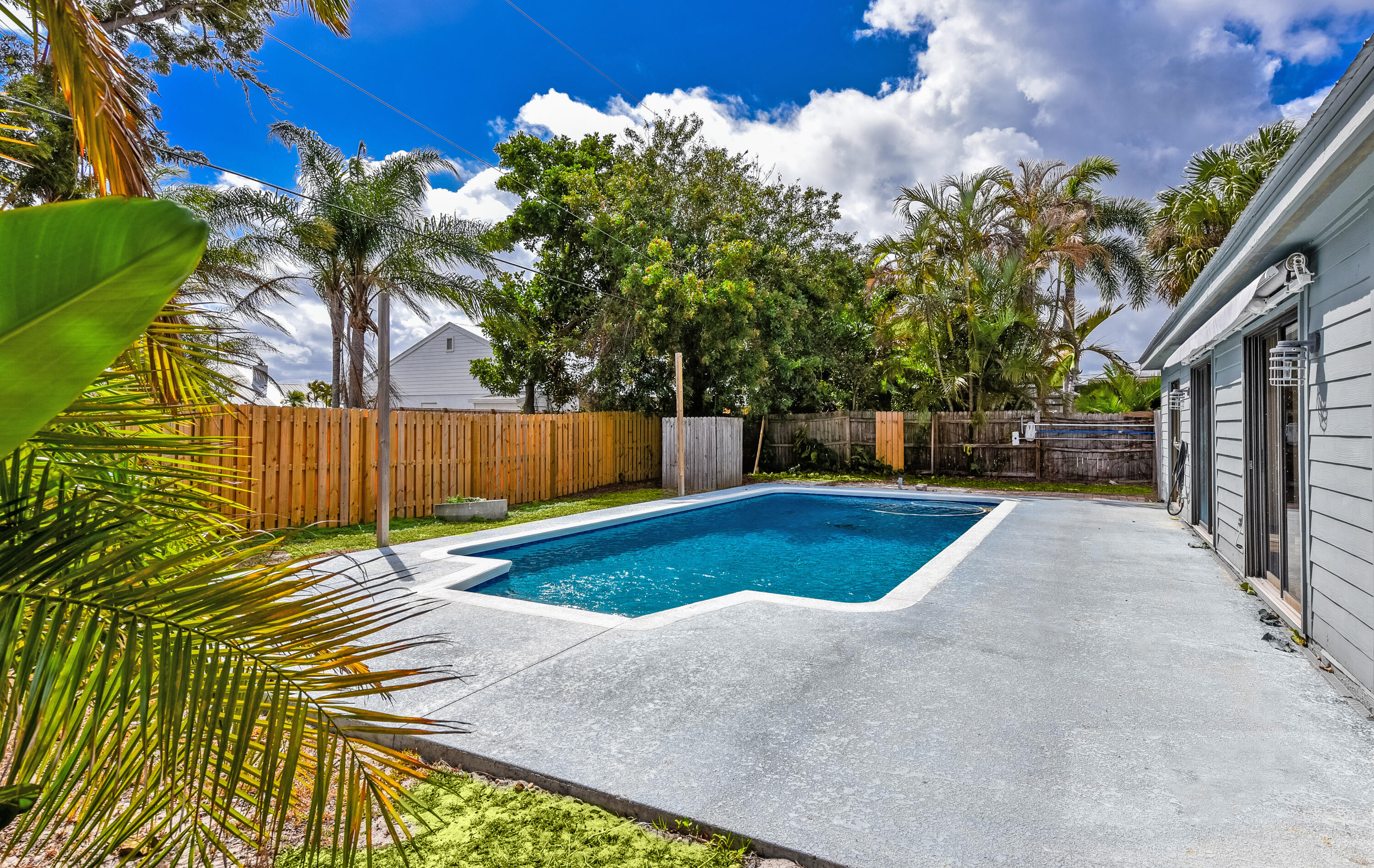 5666 Southeast Matousek Street Stuart, FL 34997 - Photo 27 of 49 a view of outdoor space and yard