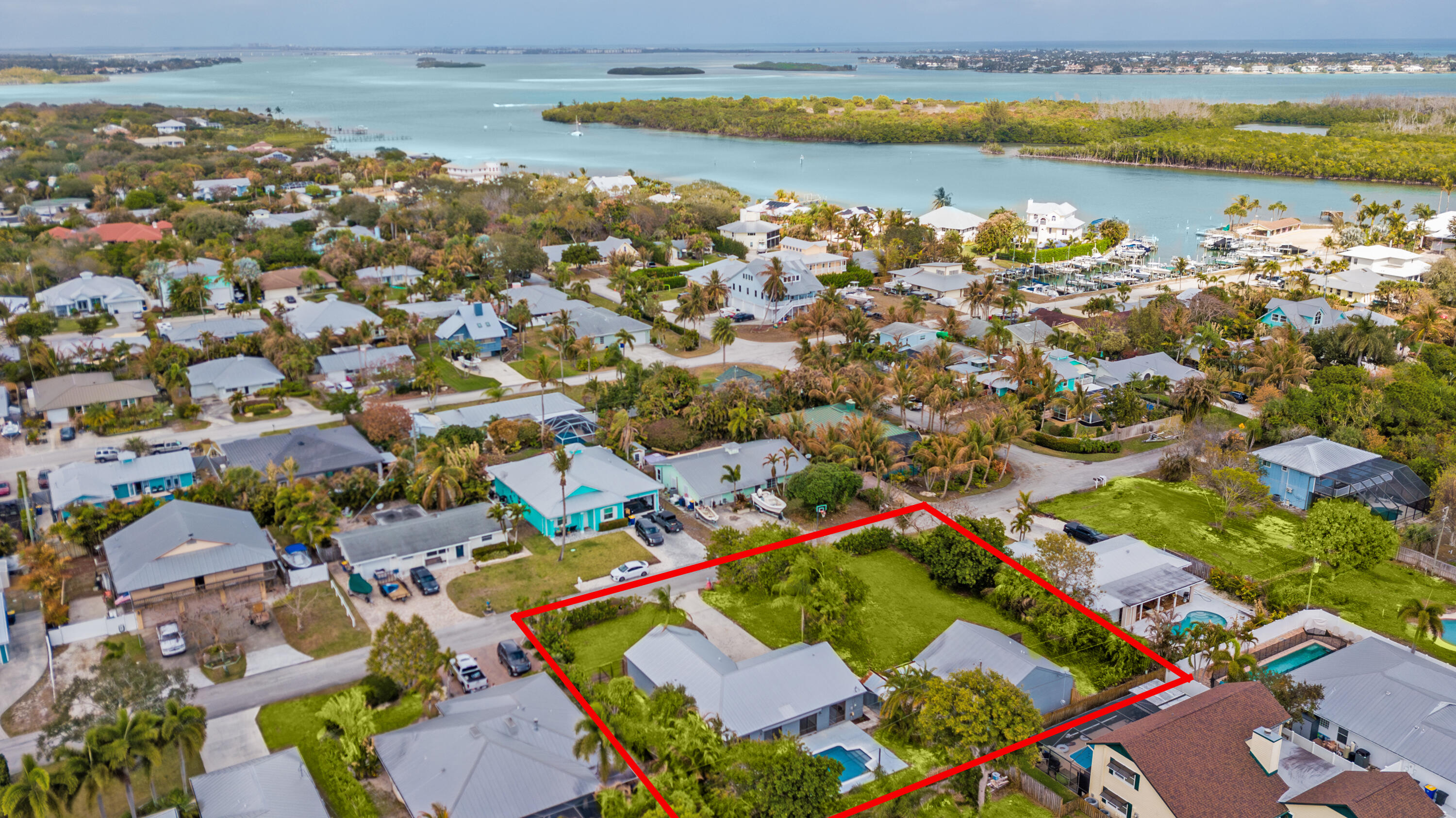 5666 Southeast Matousek Street Stuart, FL 34997 - Photo 36 of 49 an aerial view of a city